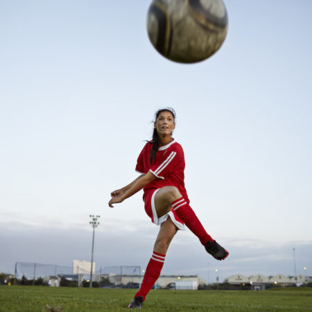Woman playing soccer