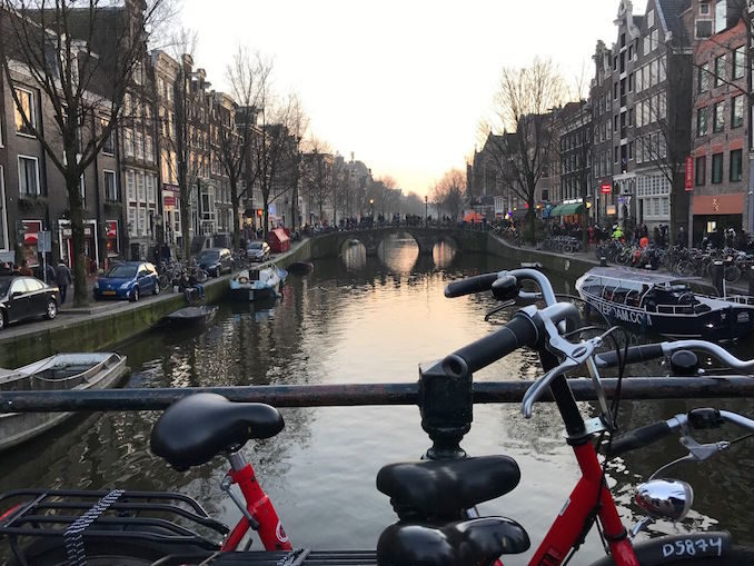 Eurail train Canal in Amsterdam, Netherlands