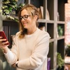 Woman phone smiling online