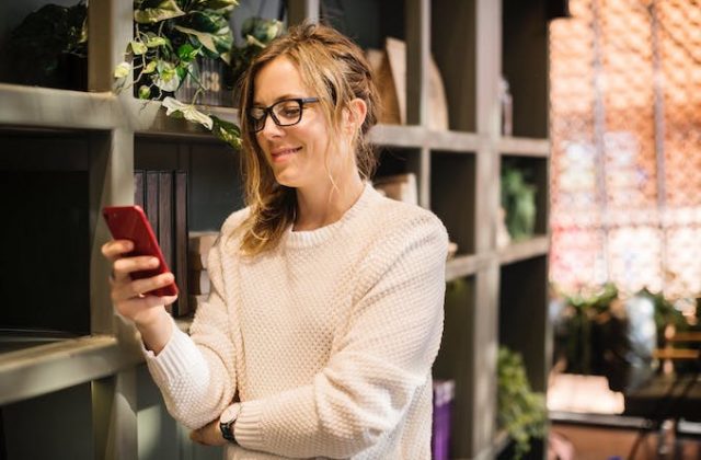Woman phone smiling online