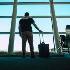 Man airport suitcase