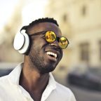 Black man sunglasses headphones