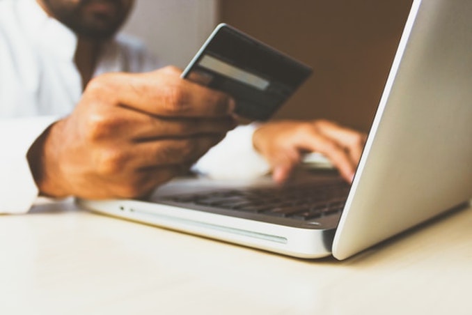 Man hands credit card online shopping