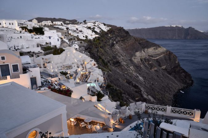 Mystique Hotel Santorini beach Greece cliff