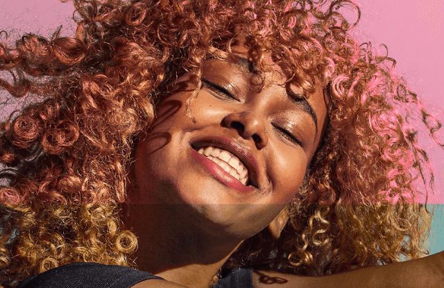 Black woman skincare happy smile