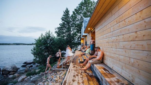 Locals in Helsinki enjoying the sea, nature and sauna on the island of Lonna. Photo: Julia Kivelä, Visit Finland.