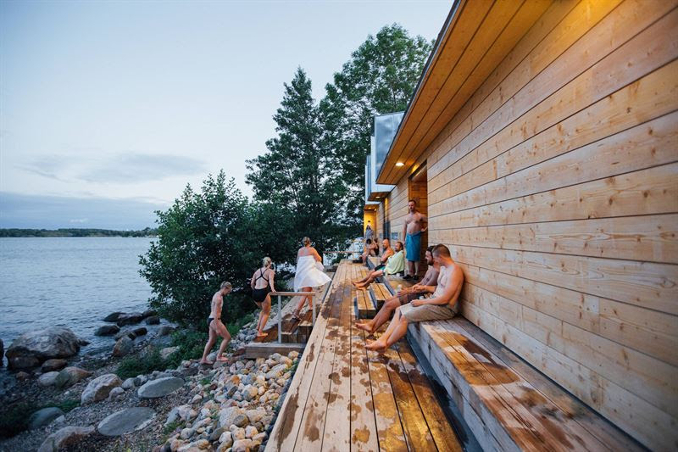 Locals in Helsinki enjoying the sea, nature and sauna on the island of Lonna. Photo: Julia Kivelä, Visit Finland.