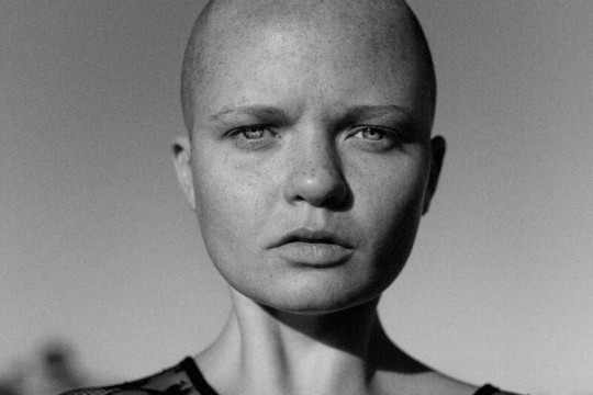 a woman with no hair