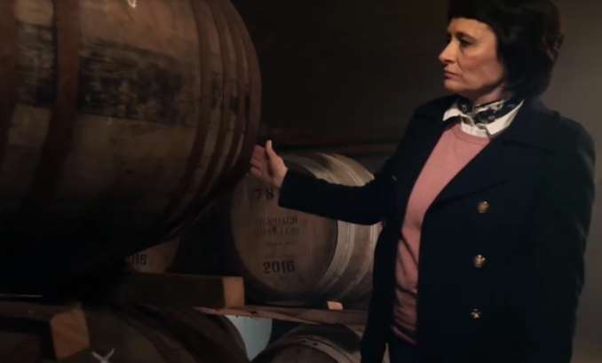 Woman barrels whiskey