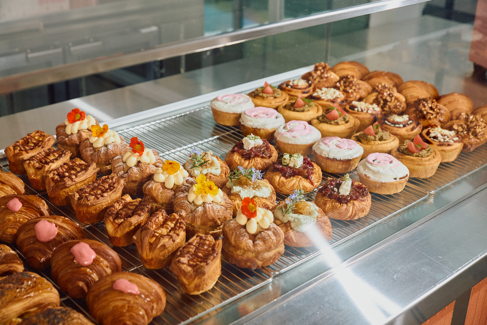 a display of pastries on a shelf